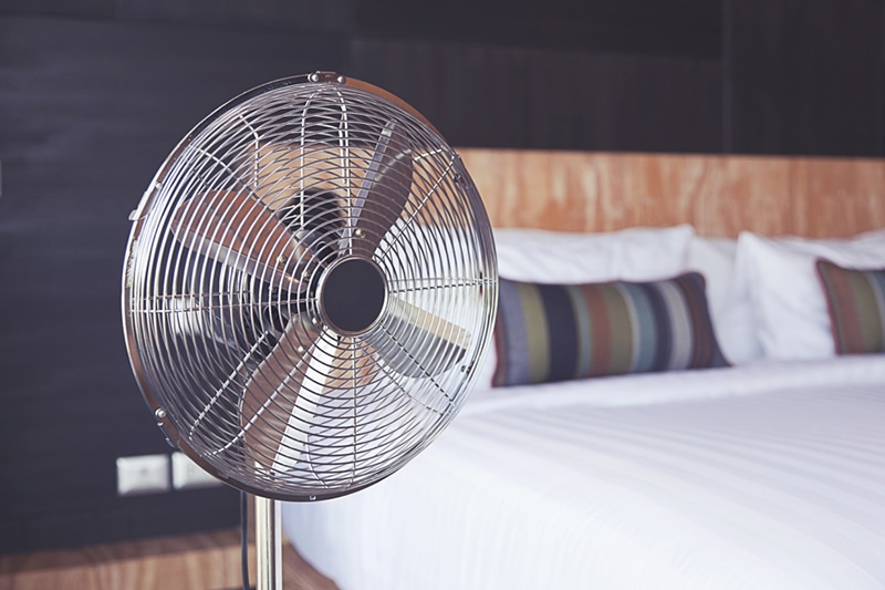 metal fan in bedroom