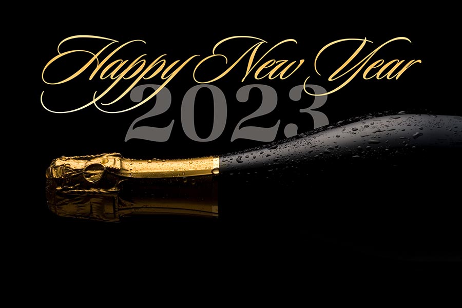 bottle of champaign with text reading Happy New Year 2023